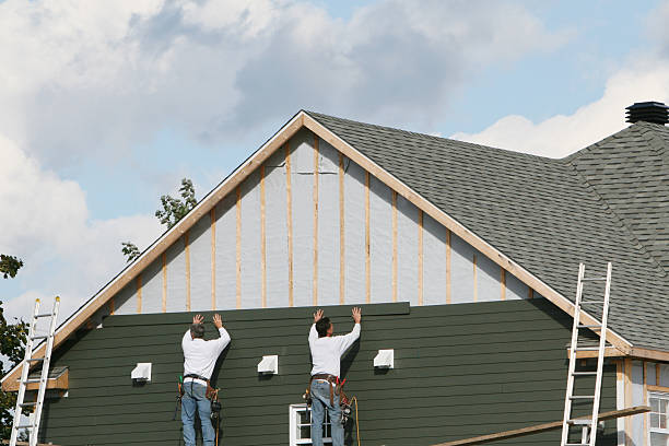 Professional Siding technician working in Hudson, NY